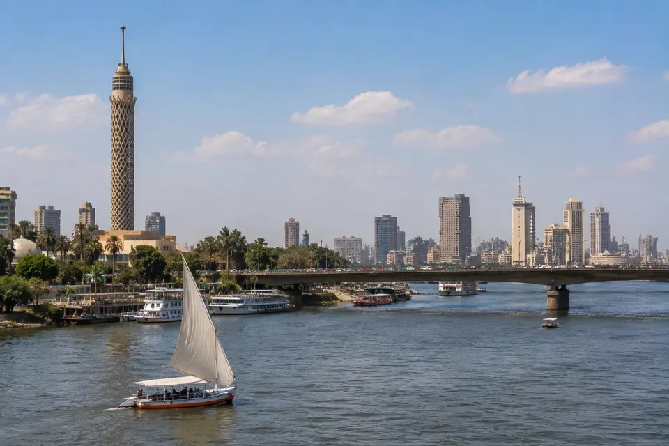 Cairo Tower and the Nile skyline with a felucca