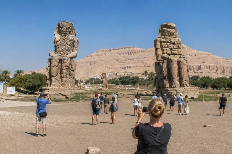Tourists at the Colossi of Memnon on the West Bank