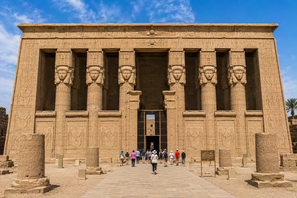 Entrance of the Temple of Hathor at Dendera under a blue sky