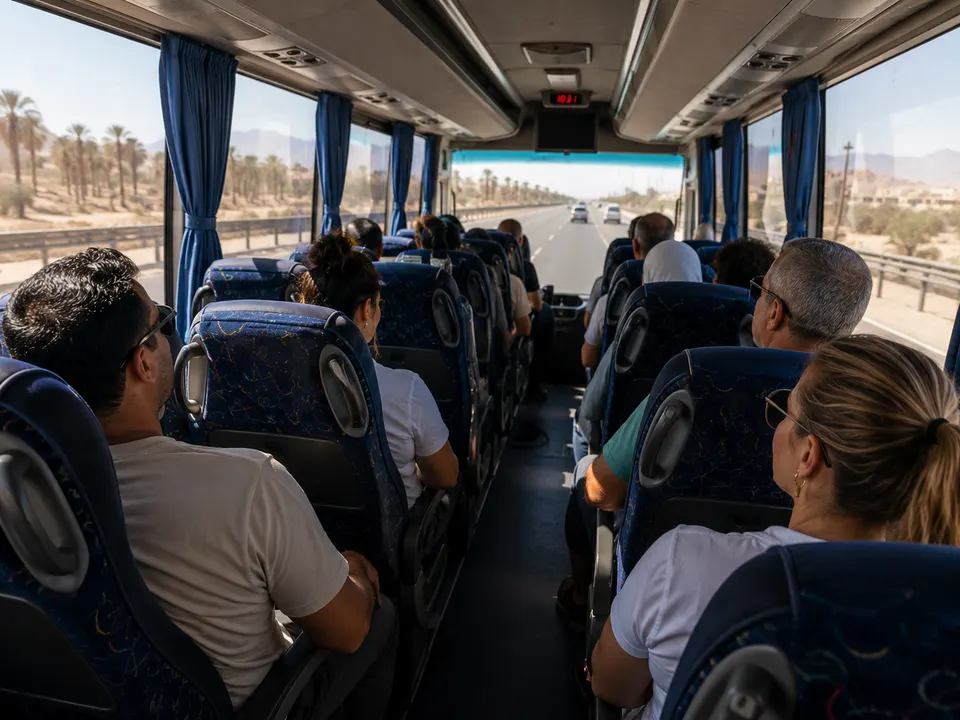Passengers on a coach crossing the desert