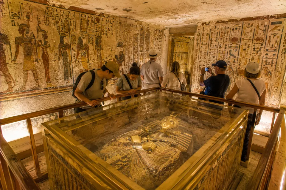Golden sarcophagus in a painted tomb in the Valley of the Kings